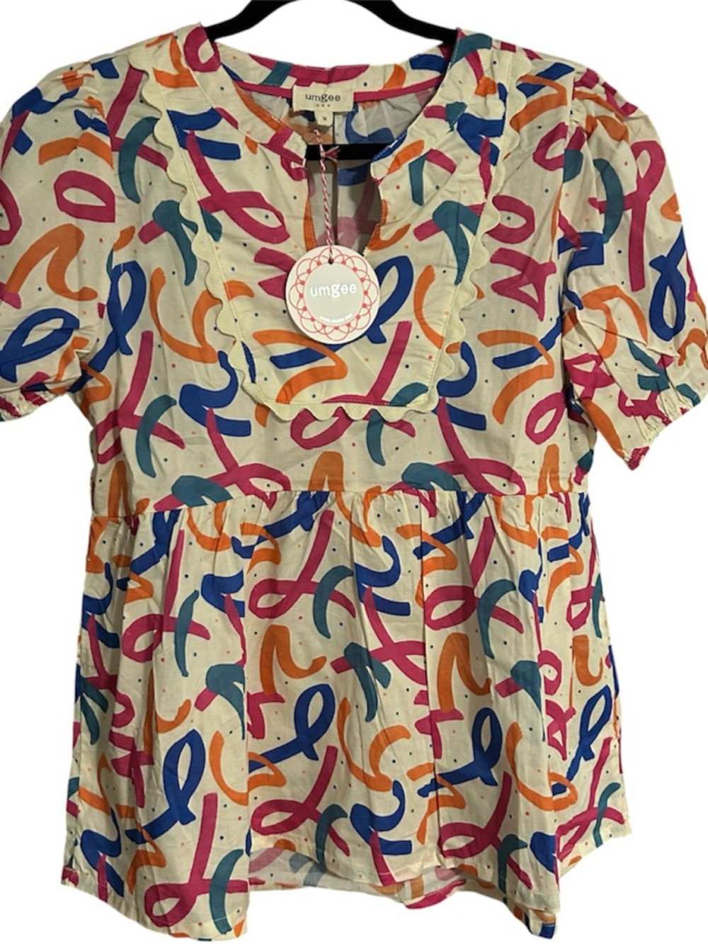 Umgee Cream Abstract Ribbon Print Blouse in Pink Blue Orange